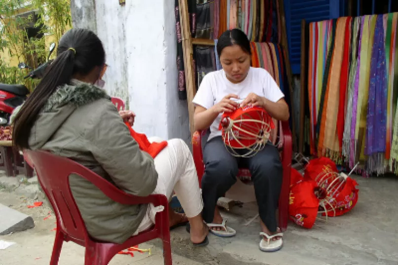 Women weaving baskets