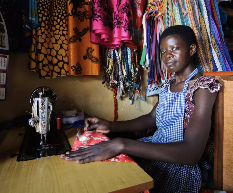 African woman at sewing machine