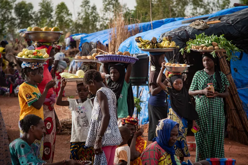 Women and children at a refugee camp in Mali. Nicolas Réméné, 2020 CGAP Photo Contest. 