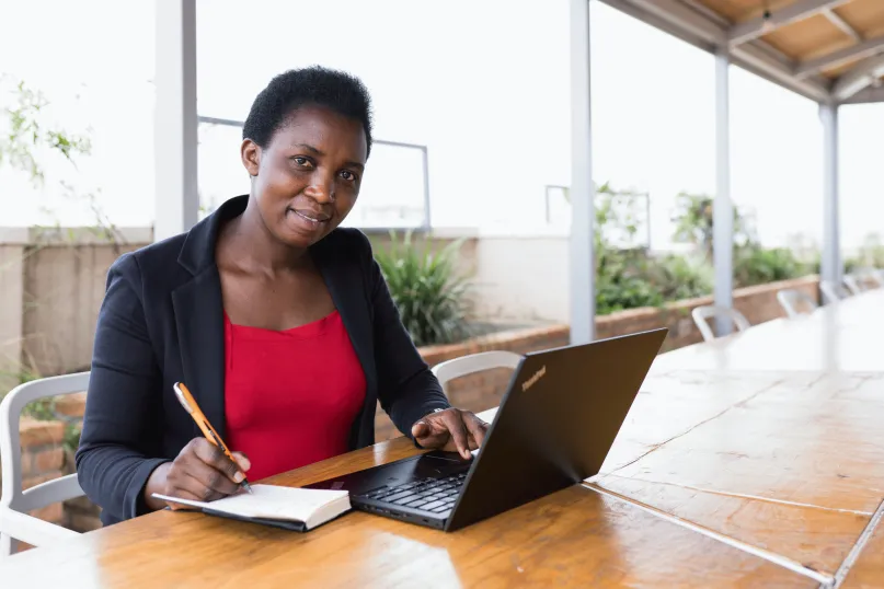 Woman working on laptop in office