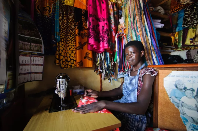 Woman with sewing machine, Uganda. Photo by Mohammad Saiful Islam, 2013 CGAP Photo Contest.