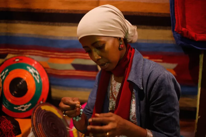 A woman doing embroidery. Photo by Mohamad Gouda, 2013 CGAP Photo Contest.