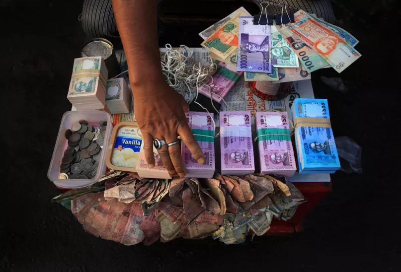 Money changer. Photo credit: Mahfuzul Hasan Bhuiyan, 2015 CGAP Photo Contest