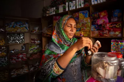 Shop owner, Pakistan. 
