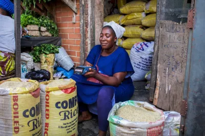 Nigerian woman selling her produce.