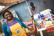 Community Health Entrepreneur Emazilie Charles in front of her mobile health store
