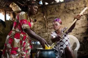 Women in rural Ghana make vegetable soup in a clean-energy cookstove that their community purchased with a microloan. Photo: Brandon Smith, 2016 CGAP Photo Contest