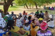 Group of women solidary group members sitting under a tree in Senegal.