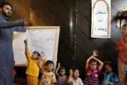 Class in a Syrian refugee camp. Photo credit: Dominic Chavez/World Bank.