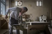 Carpenter in his workshop, Iran. Photo credit: Farnaz Damnabi, 2017 CGAP Photo Contest.